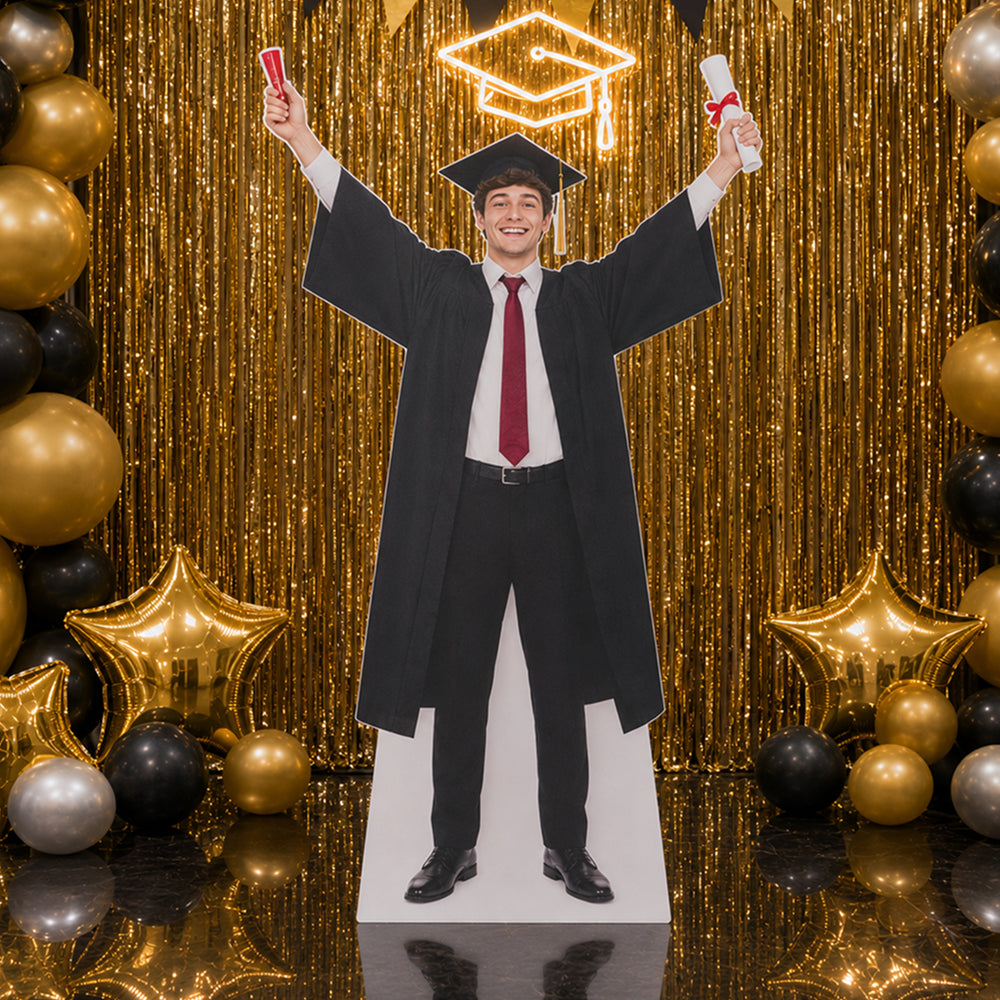 Personalized graduation cardboard cutout displayed at a graduation party celebration event