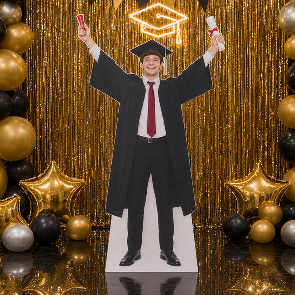 Personalized graduation cardboard cutout displayed at a graduation party celebration event